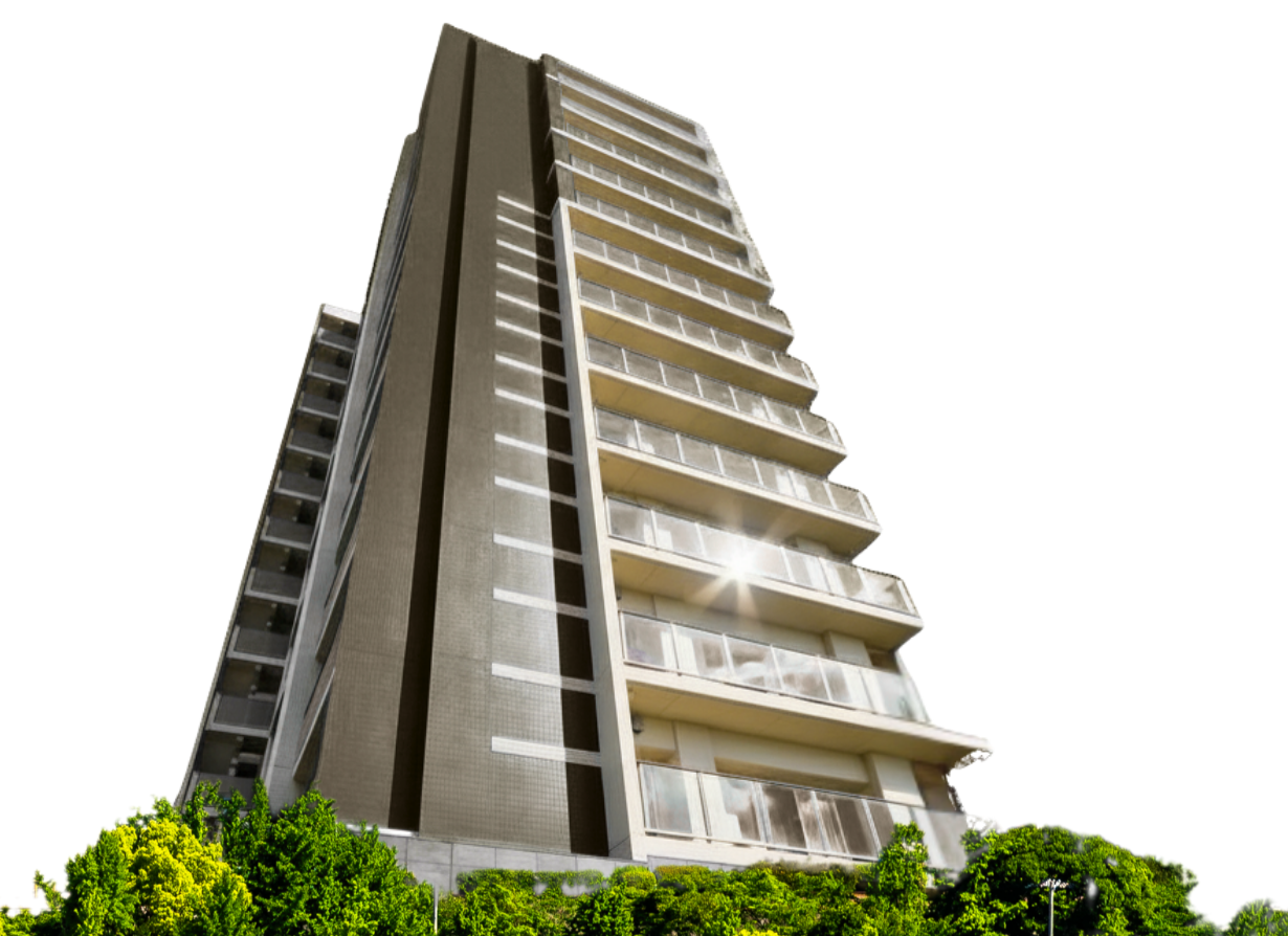 青空とマンスリーマンションの建物